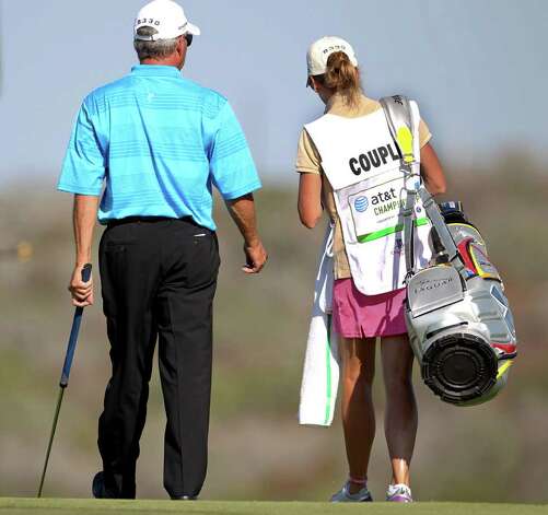 Fred Couples walks off 15 with his caddy during the second round of the ATT
