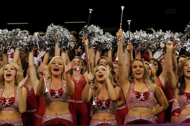 Alabama cheerleaders perform during the first half of the BCS National 