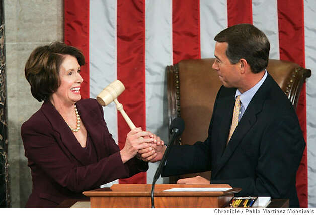 House Minority Leader John Boehner, right, hands the gavel to newly elected Speak of the House Nancy Pelosi in the House Chamber of the U.S. Capitol in Washington Thursday, Jan. 4, 2007. (AP Photo/Pablo Martinez Monsivais) Photo: PABLO MARTINEZ MONSIVAIS