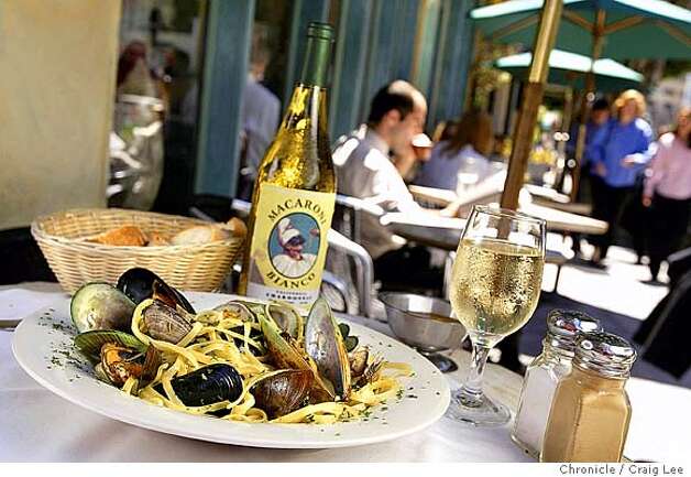 Macaroni Sciue Sciue restaurant at 124 Columbus Avenue near Jackson. Story about best pasta in North Beach. Photo of a plate of linguine with clams and mussels at Macaroni Sciue Sciue on an outdoor sidewalk table during lunch time. Event on 7/19/04 in San Francisco. Craig Lee / The Chronicle Photo: Craig Lee