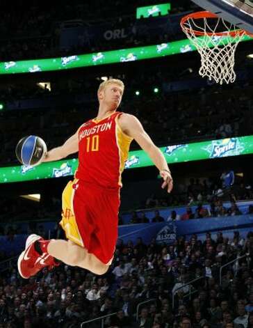 Houston Rockets' Chase Budinger (10) performs his attempt during the NBA basketball All-Star Slam Dunk Contest in Orlando, Fla., Saturday, Feb. 25, 2012. (AP Photo/Lynne Sladky) (AP) / SA