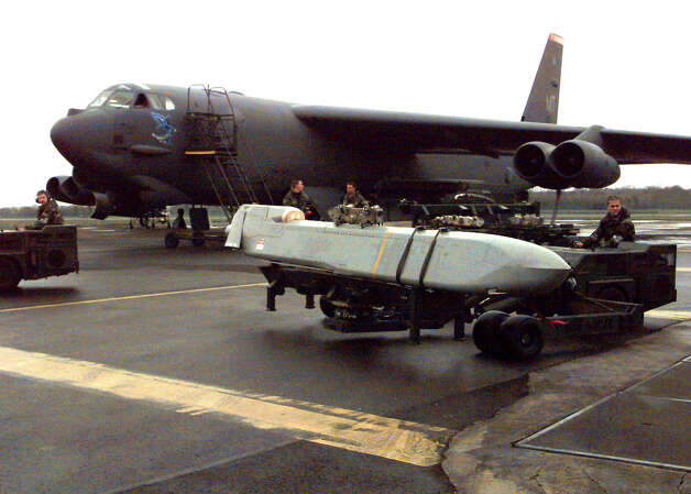 A cruise missile is carted to a waiting B-52 at RAF base Fairford, United Kingdom on March 30, 1999 in support Of NATO Operation
 Allied Force in Kosovo. Photo: USAF, U.S. Air Force/Getty Images / Getty Images North America