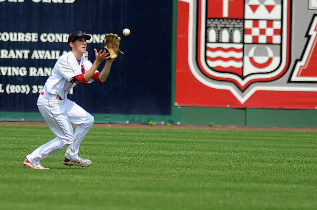 Greenwich's David Berdoff makes a catch in the outfield during Saturday's FCIAC baseball championship game at the Ballpark at Harbor Yard in Bridgeport on May 26, 2012. Photo: Lindsay Niegelberg / Stamford Advocate