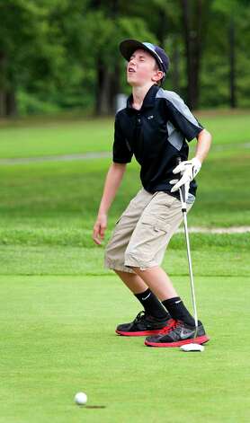 Playing in the boys 10 to 13 year old division Hayden Kistler just misses on a putt on the 9th green in the Greenwich Townwide Jr. golf championships held at Griffith E. Harris golf course, Greenwich, CT on Wednesdy August 15th, 2012. Photo: Mark Conrad / Stamford Advocate Freelance