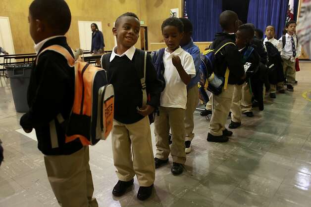 Curtis Dright III, 5, lines up with the rest of his kindergarten class on the first day of school at The 100 Black Men Community School on Tuesday Sept. 04 2012 in Oakland, Calif. Photo: Mike Kepka, The Chronicle