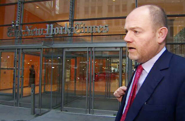 In this image released by the UK Broadcasters Pool, Mark Thompson, newly named CEO of The New York Times Co., arrives at the paper's offices, Monday, Nov. 12, 2012 in New York. Thomson, the former BBC director general was hired in August and hailed as someone who could help the company generate new revenue at a time when print publications are suffering from the loss of readers and advertisers. But in recent months, Thompson has faced questions over a decision by the BBCs Newsnight program to shelve an investigation into child sexual-abuse allegations against renowned British television host Jimmy Savile. (AP Photo/UK Broadcasters Pool) / AL