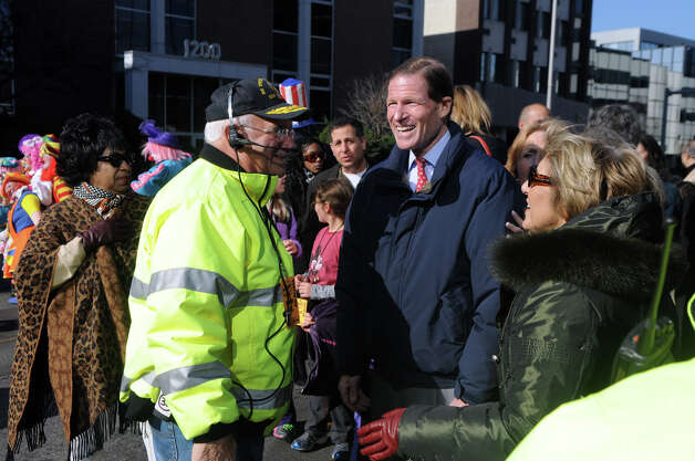 Senator Richard Blumenthal visits with DSSD president Sandy Goldstein and Ernie Orgera during the UBS Parade Spectacular in Stamford, Conn., Nov. 18, 2012. Photo: Keelin Daly / Stamford Advocate Freelance