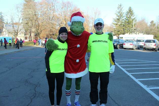 Even the Grinch was smiling, sort of, at Thursday's Turkey Trot