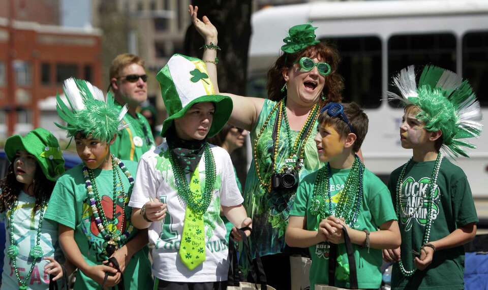 Spectators line the streets during the 54th annual Houston St. Patrick's Day Parade Saturday, March 