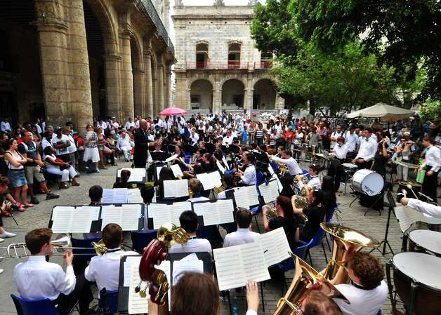 The Greenwich High School wind ensemble performs at the Plaza de Armas in Cuba during a week long trip in April 2014. Photo: Picasa, Contributed Photo / Greenwich Time Contributed