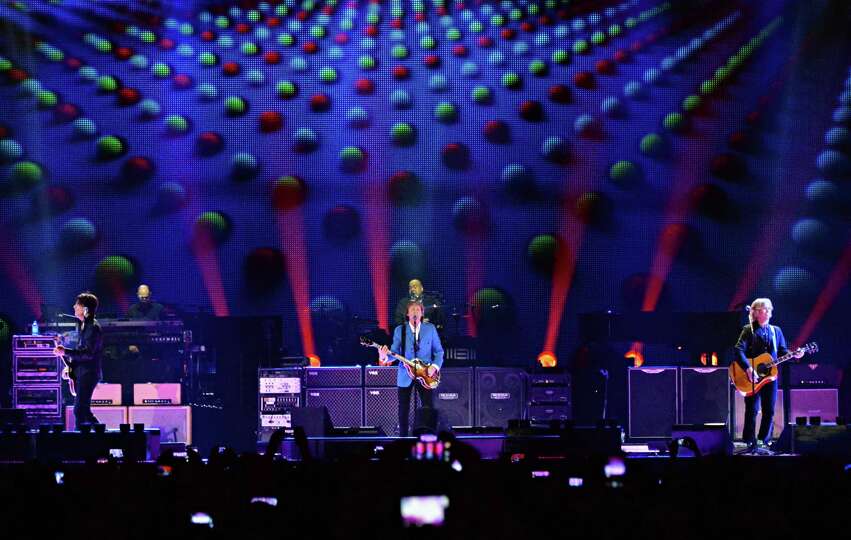 Paul McCartney, center, brings his Out There Tour to the Times Union Center Saturday July 5, 2014, i
