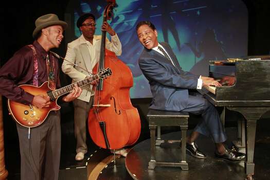 Derrick Brent II, from left, Jason Carmichael and Dennis Spears, as Nat King Cole, star in the Ensemble Theatre's production of 
