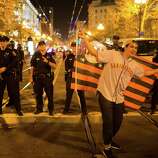 Riot cops block off Market after the San Francisco Giants beat the Kansas City Royals 3-2 in Game 7 of the World Series at Civic Center Plaza in San Francisco, Calif. on October 29, 2014.