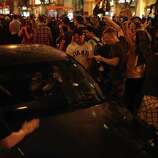 People celebrate in the streets of San Francisco after the Giants won the wold series on October 29th 2014.