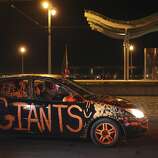 A car is decorated in the streets of San Francisco after the Giants won the wold series on October 29th 2014.