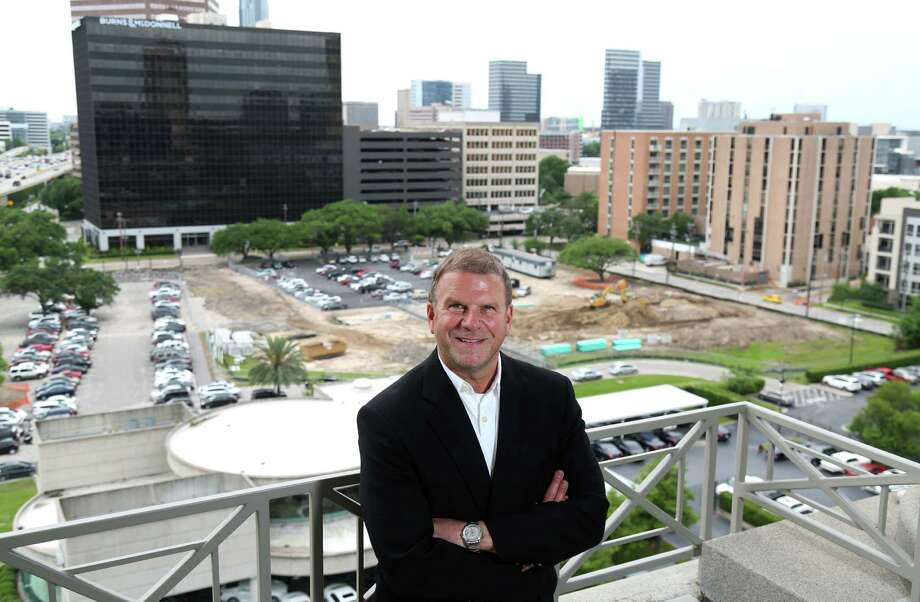 Tilman Fertitta poses for a portrait at Landry's headquarters, overlooking the site of his new development along the West Loop Wednesday, April 22, 2015, in Houston. Take a closer look at the Fertitta business empire. Photo: Jon Shapley, Houston Chronicle / © 2015 Houston Chronicle