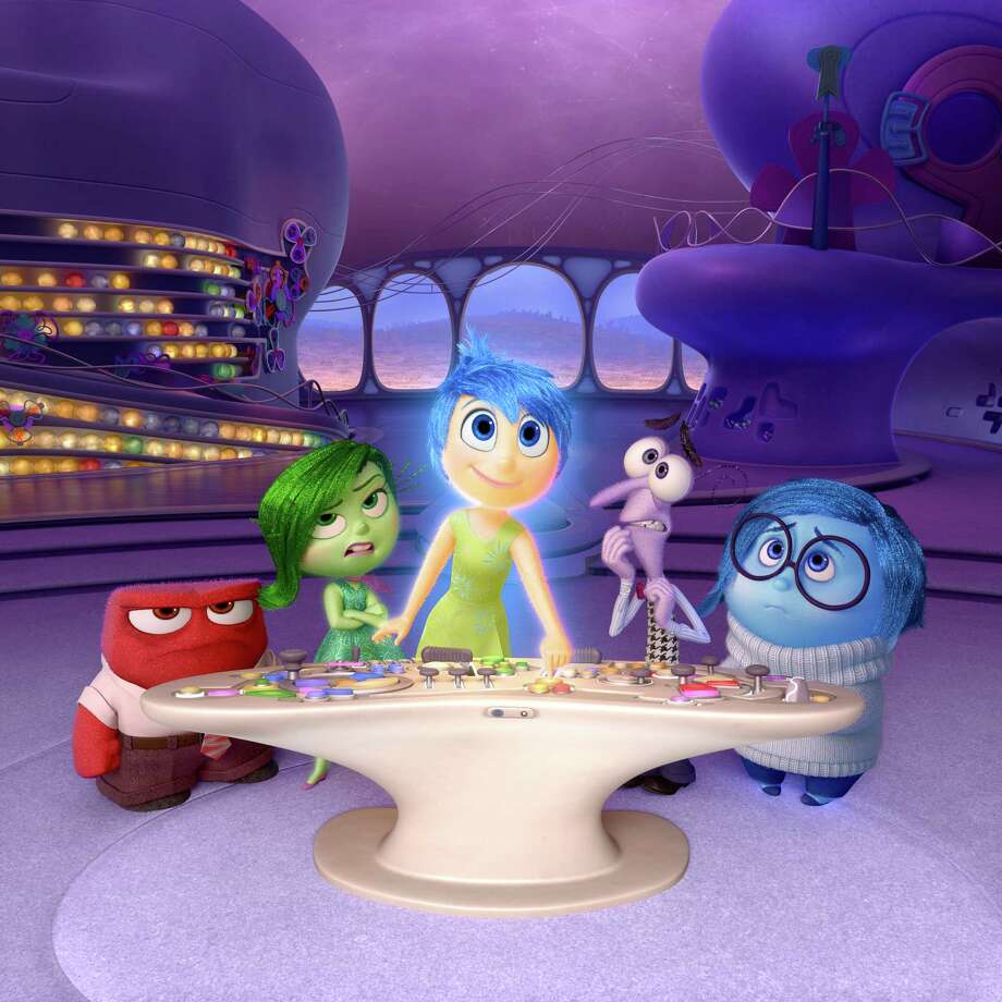 Characters (from left) Anger, voiced by Lewis Black, Disgust, voiced by Mindy Kaling, Joy, voiced by Amy Poehler, Fear, voiced by Bill Hader, and Sadness, voiced by Phyllis Smith appear in a scene from the animated film Inside Out.  Photo: Pixar, HONS