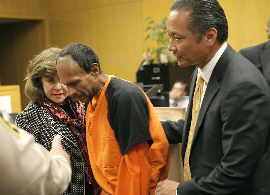 Francisco Sanchez, center, is lead out of the courtroom by San Francisco Public Defender Jeff Adachi, right, and a Spanish language interpreter (left), after his arraignment at the Hall of Justice on Tuesday. Photo: Michael Macor, Associated Press
