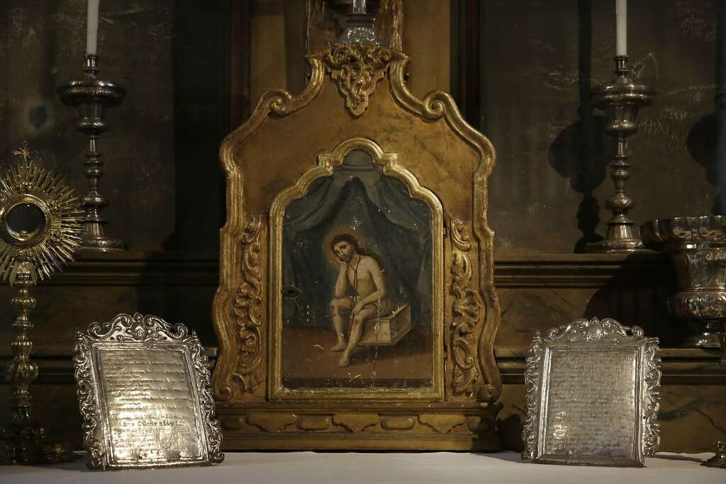 Prayer cards (left and right) brought by Father Junipero Serra to Alta California in 1769 and a Tabernacle (center) brought by Father Junipero Serra to Carmel are displayed in the Mora Chapel Gallery at Mission San Carlos Borromeo del Rio Carmelo on Thursday, September 17, 2015 in Carmel-By-The-Sea , Calif. Photo: Lea Suzuki, The Chronicle