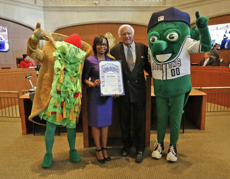 San Antonio Missions owner David Elmore and Mayor Ivy Taylor along with mascots: The Puffy Taco (far left) and the Missions Ballapeno (far right) pose as Taylor and Elmore announce that Triple-A baseball is headed to San Antonio. A study on the possibility of having baseball downtown as been kept under wraps. Photo: Kin Man Hui /San Antonio Express-News / ©2016 San Antonio Express-News