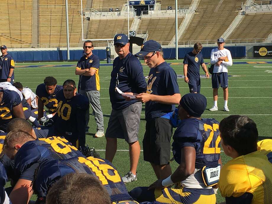 Cal equipment manager Dan Matthiesen addresses the team after a recent practice at Memorial Stadium in Berkeley. Photo: Courtesy Of Kyle McRae, Cal Athletics