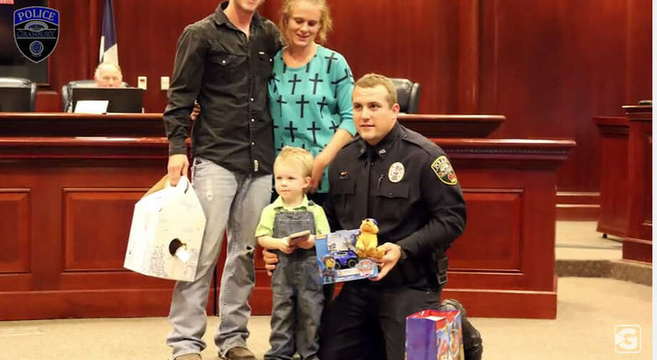 Officer Chase Miller of the Granbury Police Department performed CPR on a 3-year-old boy who was not breathing, saving the child's life, Oct. 12, 2016. The family had been at a local restaurant when the boy became unresponsive. (Granbury media via YouTube)  Photo: Granbury Media