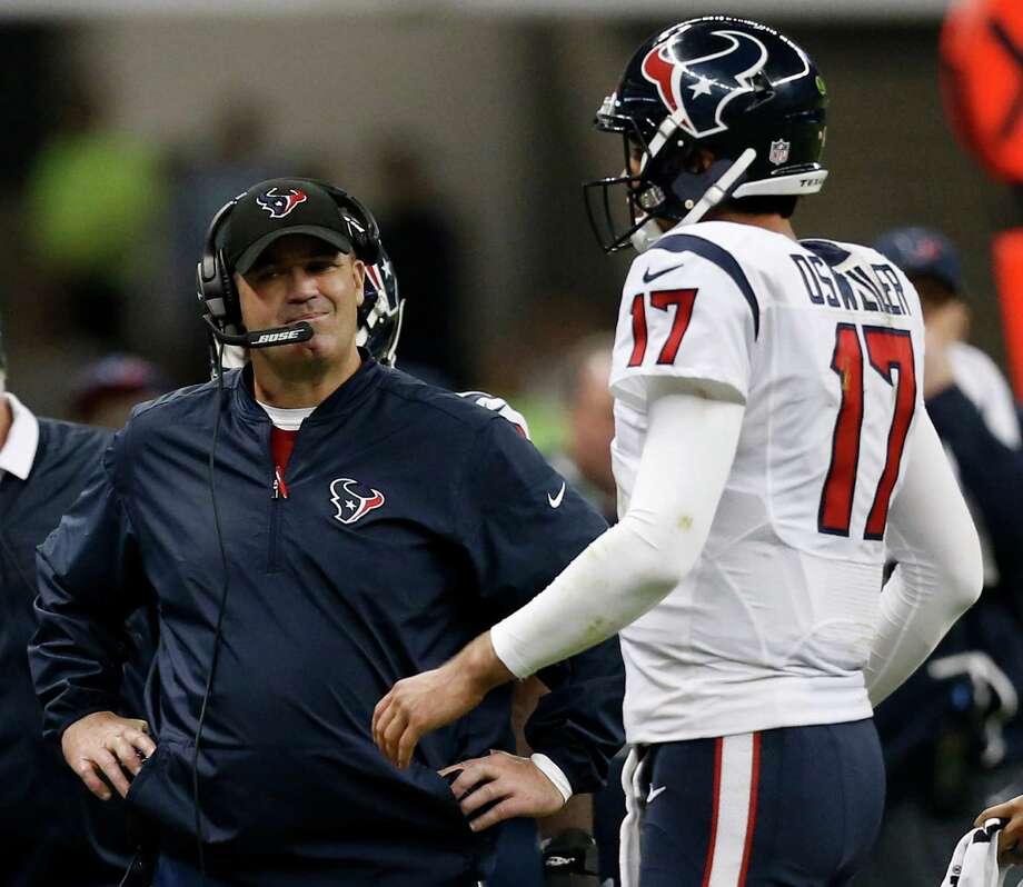Houston Texans head coach Bill O'Brien stands by quarterback Brock Osweiler (17) as he walks to the sidelines during a time out during the fourth quarter against the Oakland Raiders of an NFL football game at Estadio Azteca on Monday, Nov. 21, 2016, in Mexico City. Photo: Brett Coomer, Houston Chronicle / u00a9 2016 Houston Chronicle