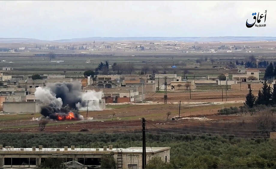 An image from militant video posted online by a media arm of the Islamic State group on Monday purports to show the moment of a Turkish missile strike in ﻿al-Bab, Syria﻿. Photo: UGC / Amaq News Agency