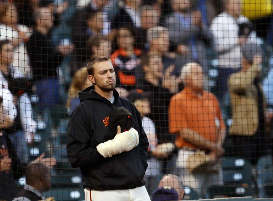 San Francisco Giants pitcher Jeremy Affeldt with a bandaged right hand watches opening ceremonies prior to the start of the Giants game with the San Diego Padres at AT&T Park on Tuesday September 13, 2011 in San Francisco, California. Photo: Lance Iversen, The Chronicle