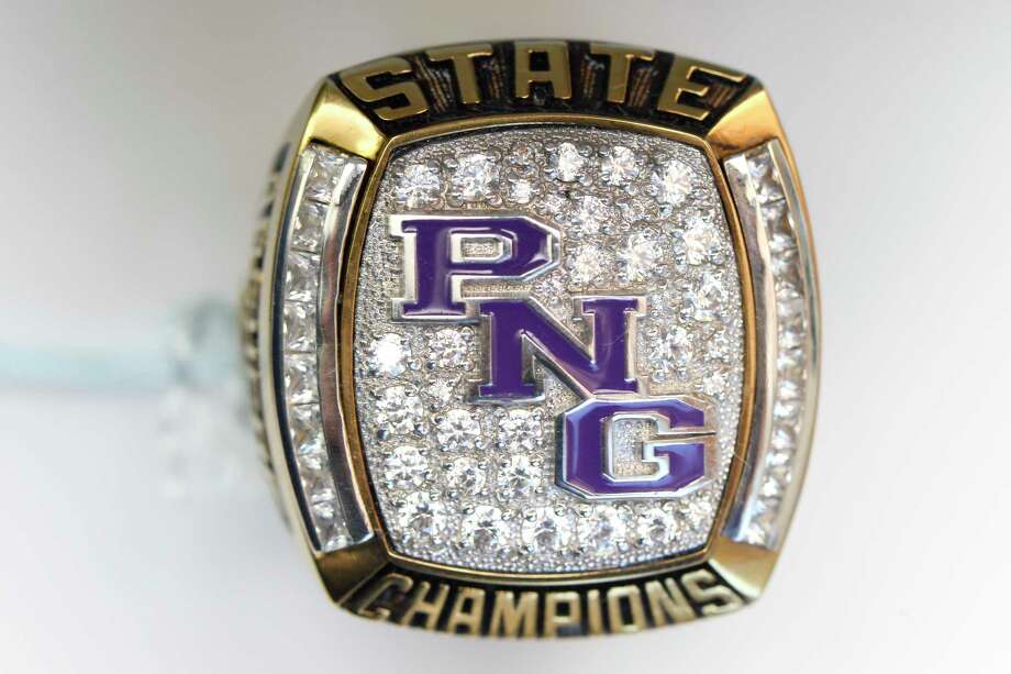 The Port Neches-Groves 2017 baseball state championship rings feature the school's initials on the face with their season record and the player or coach's last name on the sides. Photo taken Wednesday 10/4/17 Ryan Pelham/The Enterprise Photo: Ryan Pelham / ©2017 The Beaumont Enterprise/Ryan Pelham