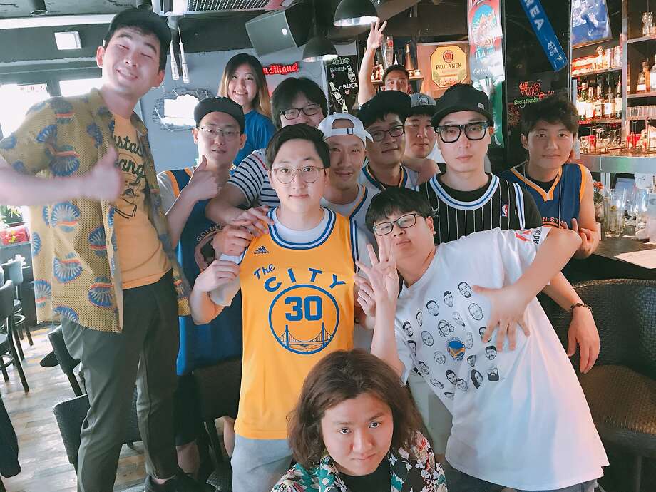 Lee Hyun Min (center, wearing yellow The City jersey) and members of the Let's Go Warriors Fan Club of South Korea celebrate their favorite NBA team, the Golden State Warriors, in a photo dated July 15, 2017. Photo: Photo Courtesy Lee Hyun Min