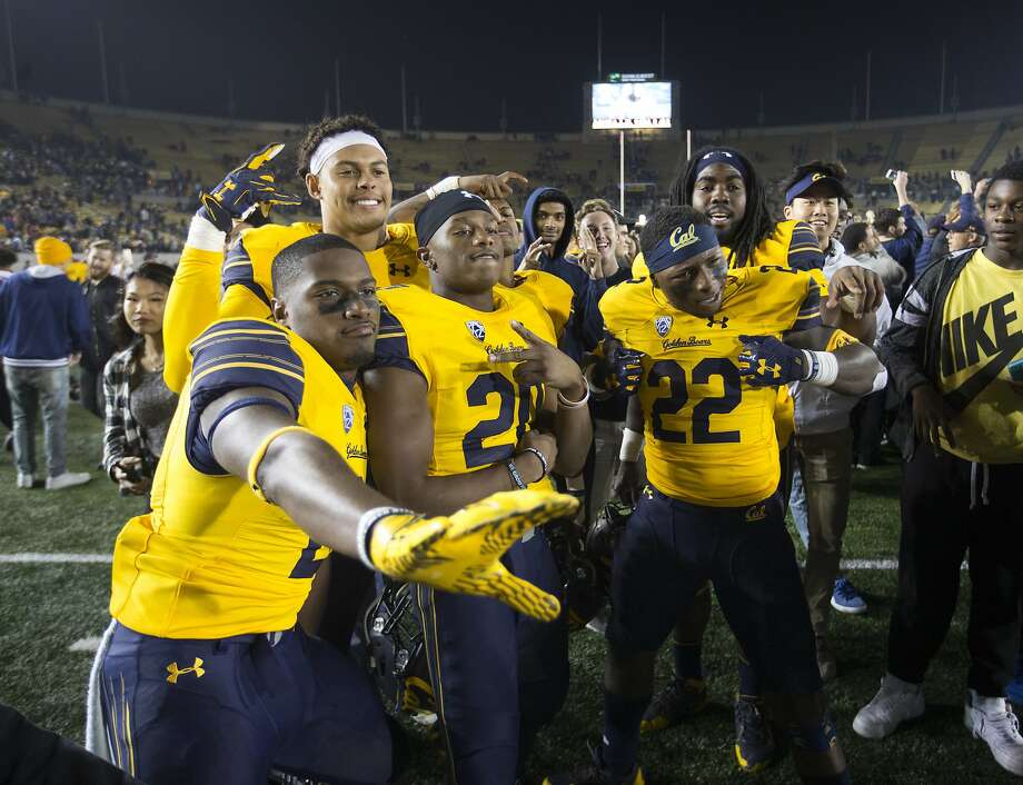 California players pose for a celebratory picture after their team upset eighth-ranked Washington State in an NCAA college football game, Friday, Oct. 13, 2017, in Berkeley, Calif. Cal won 37-3. (AP Photo/D. Ross Cameron) Photo: D. Ross Cameron, Associated Press