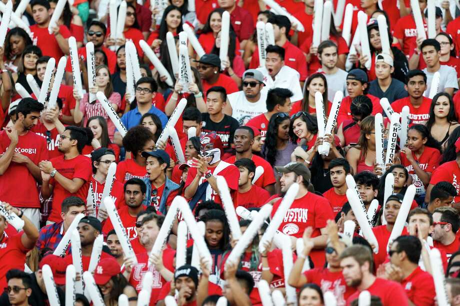Houston fans cheer during the first quarter of an NCAA football game against Connecticut at TDECU Stadium on Thursday, Sept. 29, 2016, in Houston.For a look at fan bases that had the highest and lowest expenses to attend this year's bowl games, browse through the gallery. Photo: Brett Coomer, Houston Chronicle / © 2016 Houston Chronicle