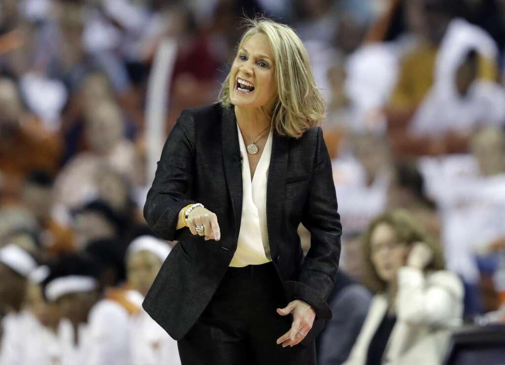 Texas head coach Karen Aston talks to her players during the first half of an NCAA college basketball game against Connecticut, Monday, Jan. 15, 2018, in Austin, Texas. (AP Photo/Eric Gay) Photo: Eric Gay/Associated Press