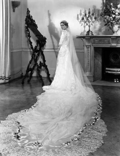 1933: Actress Ann Todd models her wedding gown. Designed and made ...