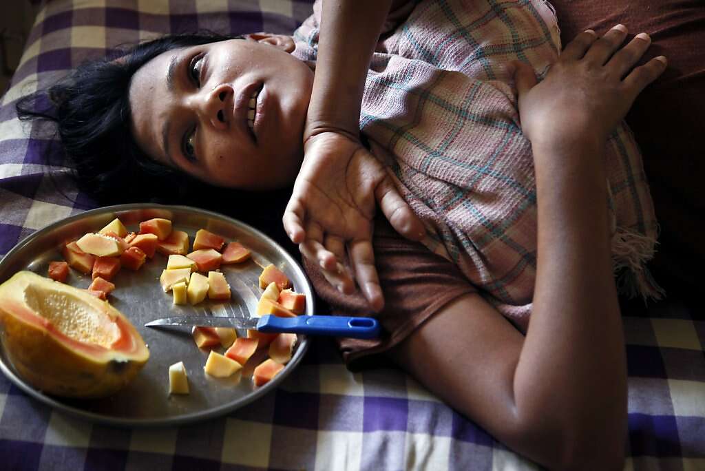 Manisha Parmar has little appetite three days after a Caesarean section at the Akanksha Infertility Clinic, Sunday, May 26, 2013, in Anand, India. Photo: Nicole Fruge, The Chronicle