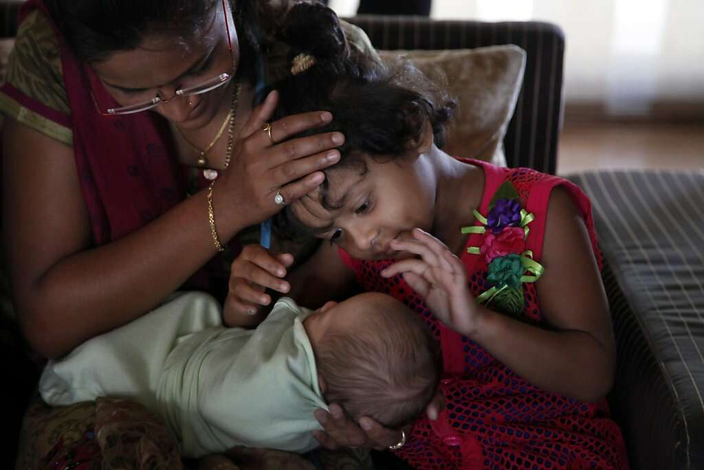 Hotel guests meet baby Kyle Benito-Kowalski at the Madhubhan Resort and Spa in Anand, India, Tuesday, May 28, 2013. Photo: Nicole Fruge, The Chronicle