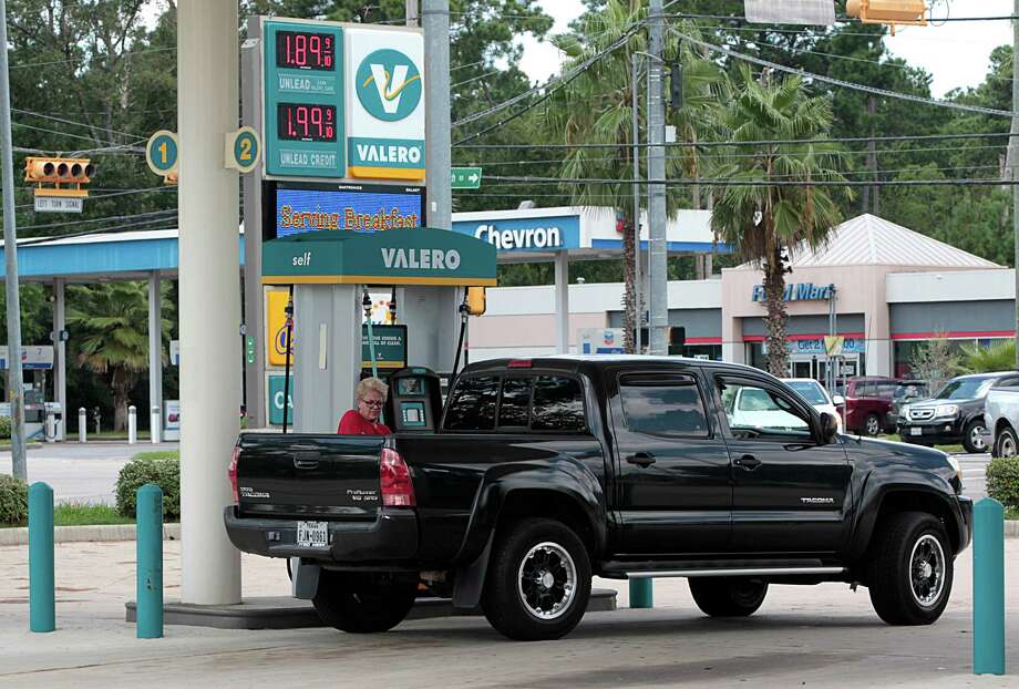 Katie Leonard fills her truck up with gasoline at the Easy Lane Food Mart and Valero gas station in the 5200 block of Louetta Aug. 24, 2016, in Spring. ( James Nielsen / Houston Chronicle ) Photo: James Nielsen, Staff / © 2016 Houston Chronicle
