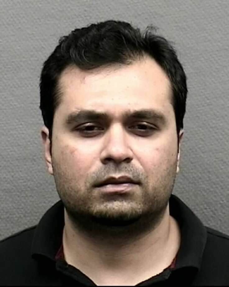 Usman Tassadiq was arrested by the Houston Police Department and faces a felony charge of trademark counterfeiting.  Photo: Houston Police Department 