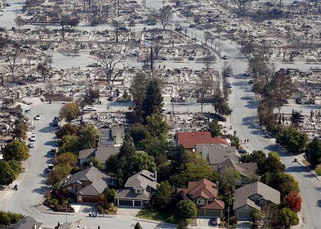 Fire lines: Heartbreaking photos show homes burned next to homes spared in Wine Country fires
